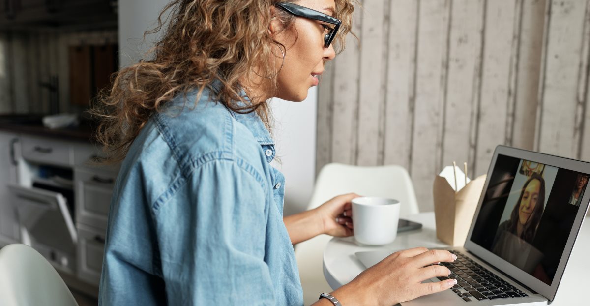 Picture of lady using laptop at home